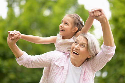 Woman Playing With Her Grandchild